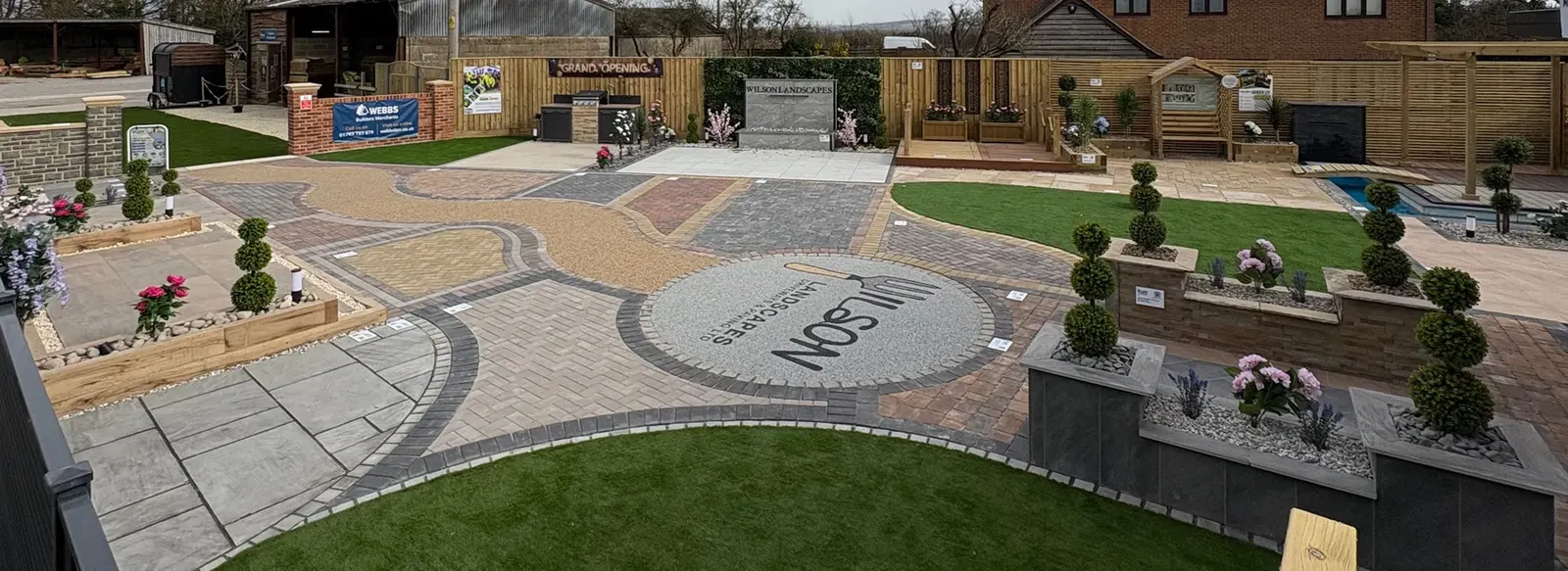 The Wilson Landscapes showroom, with block paving, resin, porcelain paving, lawns and planters laid out side by side